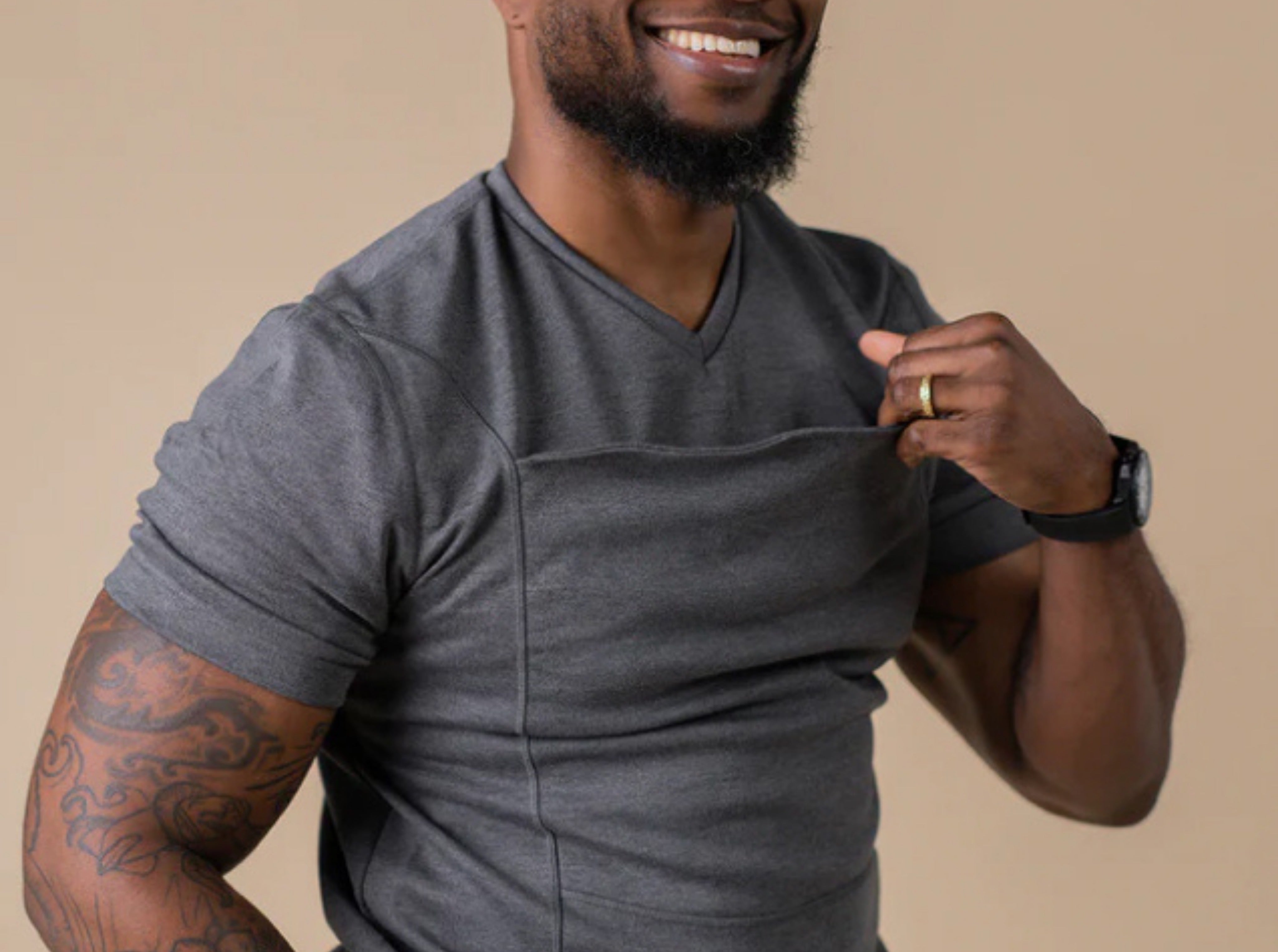 Model showing fit of the Dad Shirt without a baby. A snug fit is important for proper functionality.