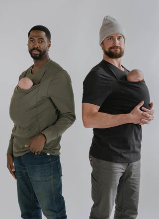 Two males wearing newborns in a Fern (green) long sleeve dad shirt and a black short sleeve Dad Shirt.
