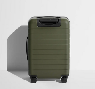 Green hard sided suitcase with wheels