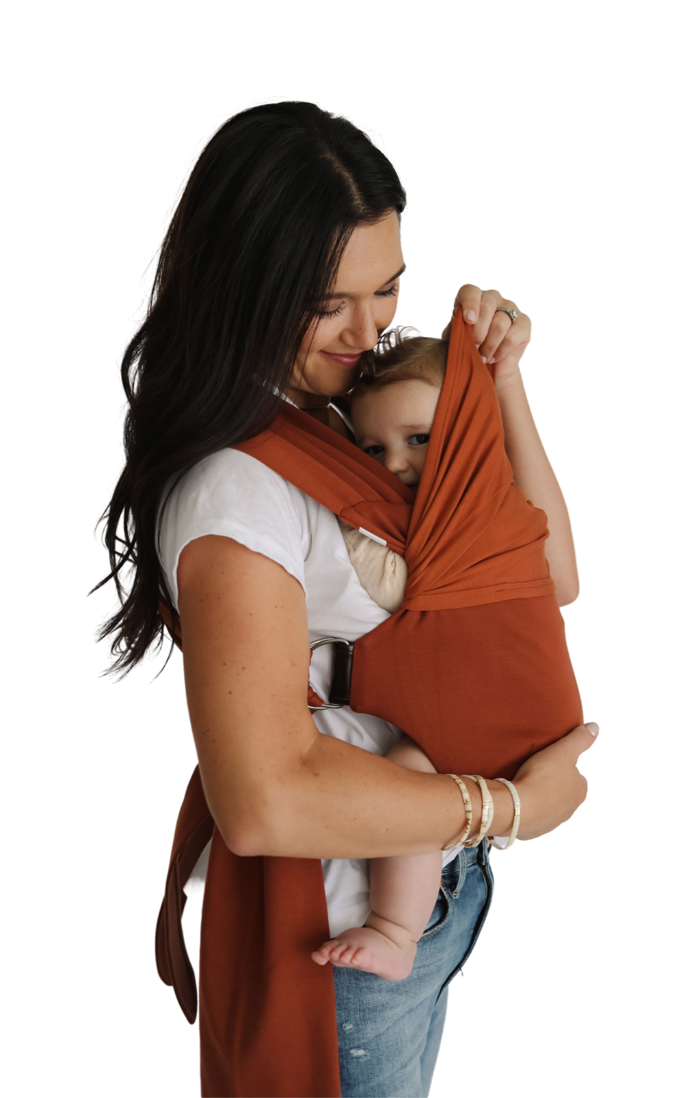 Female front carrying a baby in a Clay Simple Wrap.