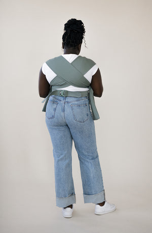 Back view of an Olive Simple Wrap worn for front carrying.