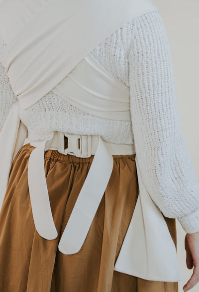 Back view of a Natural Simple Wrap worn for front carrying.