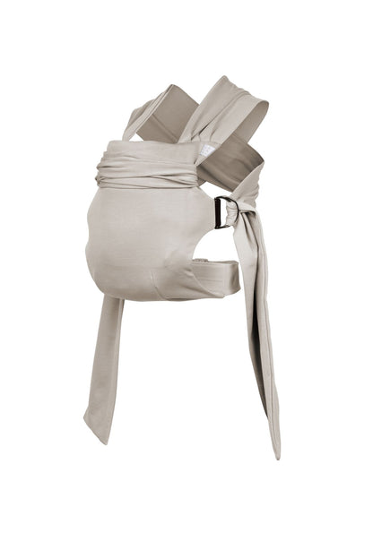 Simple Wrap carrier, with buckle waist belt and rings to attach fabric straps, in Flax.